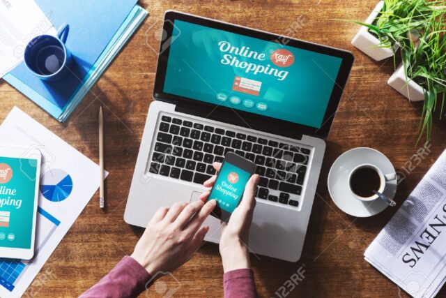 Online store with products displayed on a laptop and smartphone Products being sold through an online store