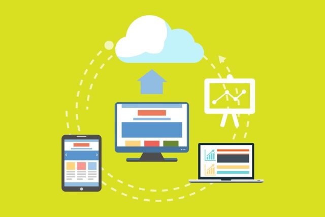 Cloud storage concept with files synchronized between laptop, smartphone and cloud Files synchronized between devices using cloud storage